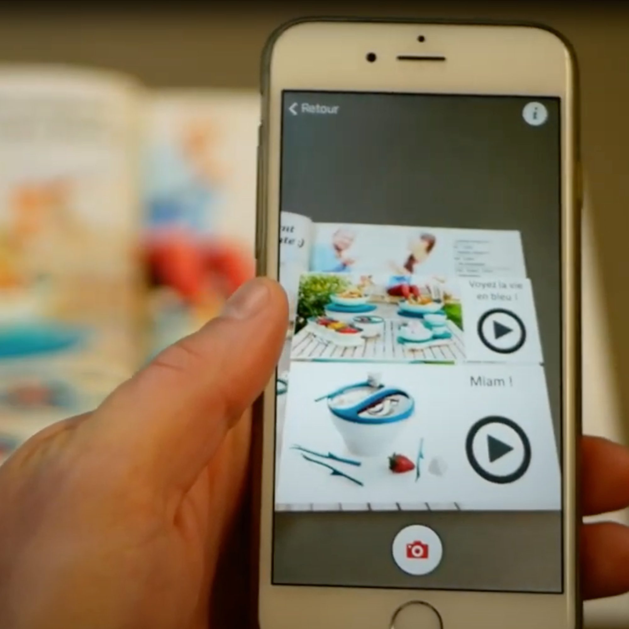 snappress_1000x1000 écran de smartphone avec des augmentations sur SnapPress ARGOplay du catalogue imprimé Tupperwea